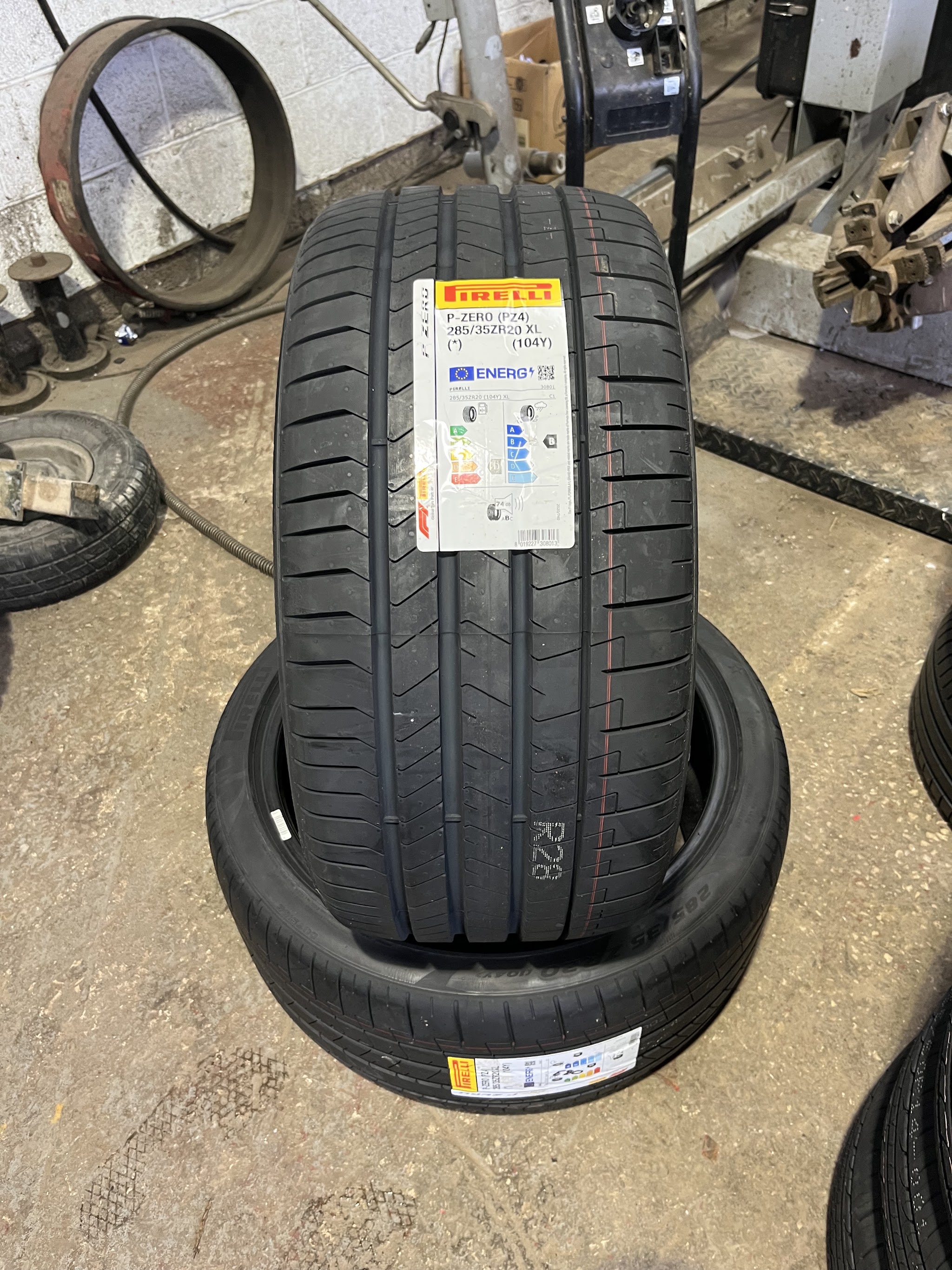 A new Pirelli tyre with its label on, ready to fit