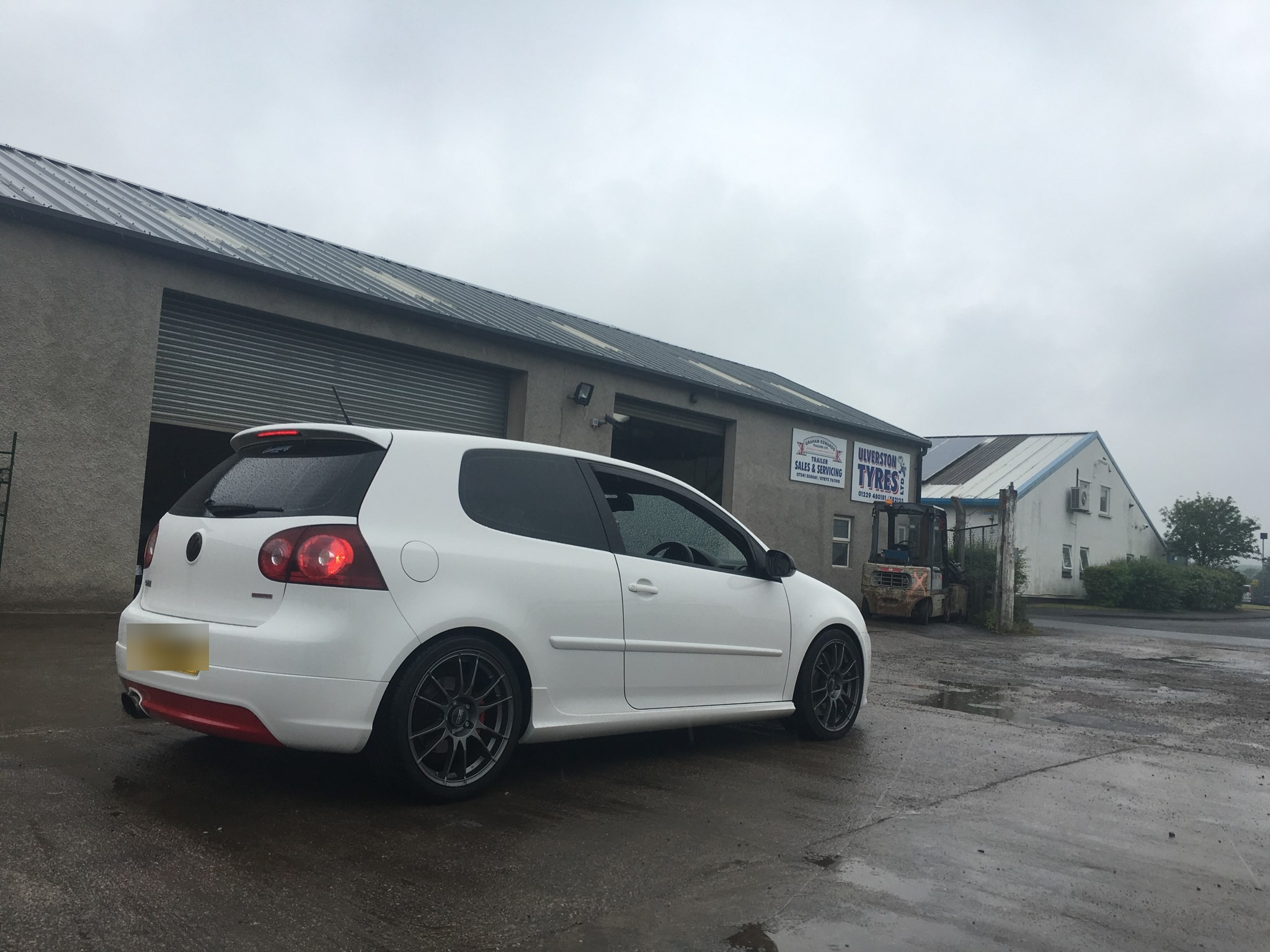 The yard and workshop on Cross Lane on a grey day