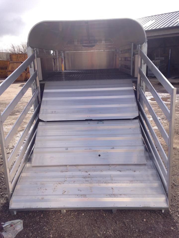 Inside a Graham Edwards livestock trailer, alloy loading gates open